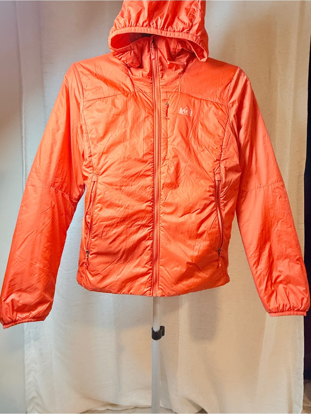 REI Co-op PrimaLoft Insulated Hooded Jacket is a size Small,